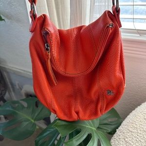 The Sak Orange Cross Body Bag